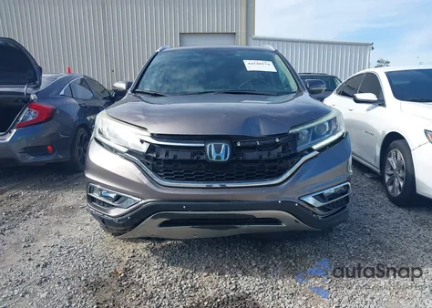 2016 Honda Cr-V Touring z USA, uszkodzony, nr VIN 5J6RM3H97GL004260